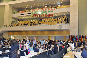 Delegates rejoice after the results of a vote to adopt Convention 189 on domestic work at the 100th Session of the International Labour Conference in Geneva, on 16 June 2011. Photo credit: International Labour Organization