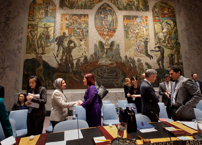 Prior to the opening of the open debate, Suaad Allami greets María Cristina Perceval, Permanent Representative of Argentina to the UN and President of the Security Council for October. Photo: UN Women/Ryan Brown