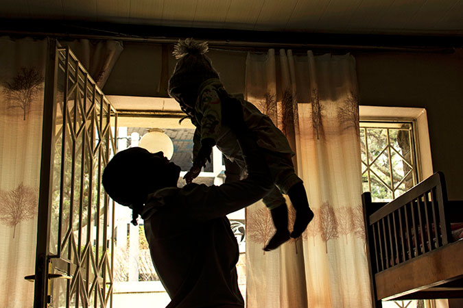 A survivor at Association for Women’s Sanctuary and Development (AWSAD) with her child. Photo: Womankind Worldwide/Maheder Tadese