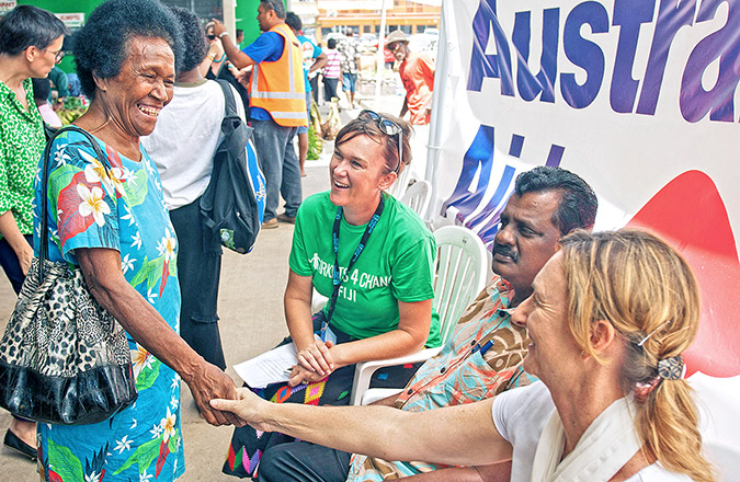 UN Women’s Aleta Miller with Hon Parveen Bala Kumar (Fiji’s Minister of Local Government), and Suzanne Bent (First Secretary of Gender Equality for Australia's Department of Foreign Affairs and Trade in Fiji) in Rakiraki at the handover of tents that act as a temporary market space while the new market house is being built. Photo: UN Women/Murray Lloyd