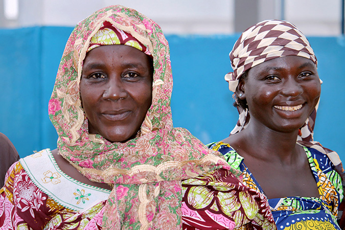 Awal Wakili Moussa, Vice President of the Managing Committee of the Women Cohesion Space in Minawao (centre). With the economic assistance she received from UN Women, Moussa set up her own business. She now lives in the host community of Gawar, and organizes meetings between women refugees and the host community to facilitate understanding and cohesion. Photo credit: UN Women/ Fajong Joseph 