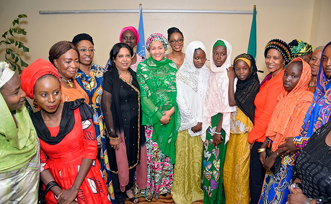 UN Women Executive Director Phumzile Mlambo-Ngcuka with women leaders and young women affected by conflict in Abuja. Photo: UN Women