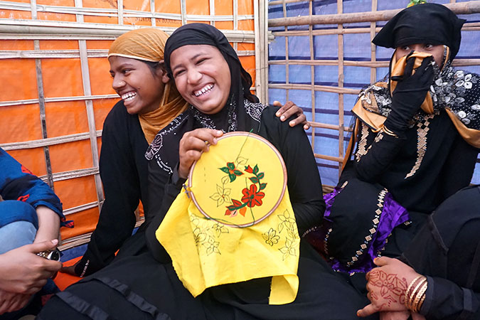 Adolescent girls in the safe space for women and girls in Bhalukhali Rohingya refugee camp, Cox’s Bazar. Photo: UN Women/Theresia Thylin
