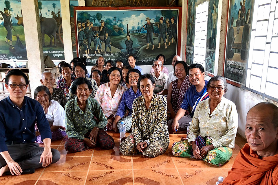 Participants in an association for survivors of violence during the Khmer Rouge, which acts as a support group, gather in the Kampong Chhanang Province in Cambodia. Photo: UN Trust Fund/UN Women/Adina Wolf
