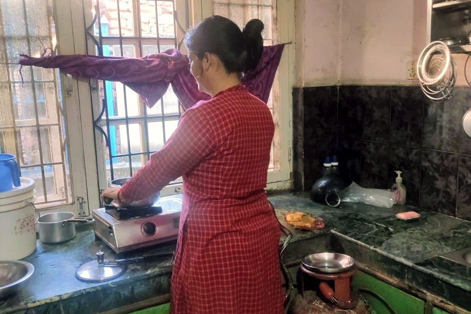 Dhana in her home. 