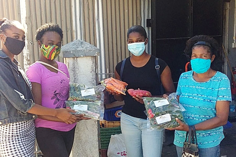 Kimara Lugay of Lindo Mart Supermarket, Lennisha Leblanc of Morne Prosper Women Farmers Group, Vanessa Julien of Warner Farmers Producers Inc., and Priscilla Jean Jacques of Morne Prosper. Photo: UN Women/Dawn Francis