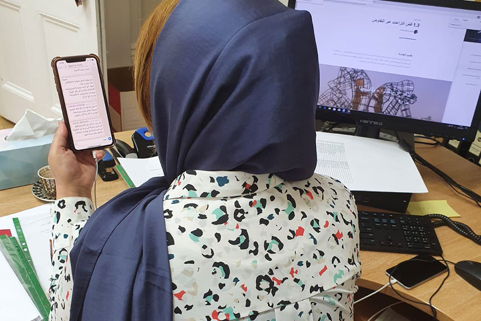 Women peacebuilders are using their mobile phones to support COVID-19 response efforts in Libya. Photos: Courtesy of Libyan Women’s Network for Peacebuilding.