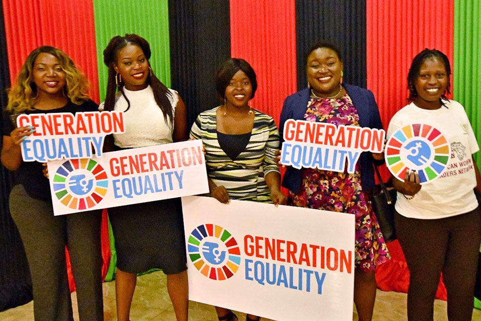 Thelma Kaliu and fellow activists celebrate the launch of the Malawi Chapter of the African Women Leaders Network. Photo: UN Women/Faith Mvula