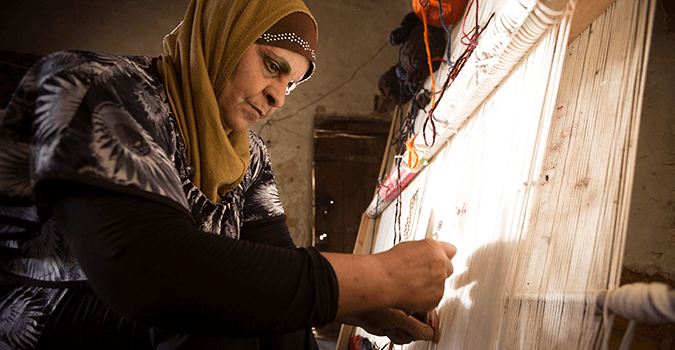 Traditional carpet maker supported by the grantee Society for the Protection of Nature in Lebanon. Photo: UN Women / Joe Saade and Ghinwa Daher