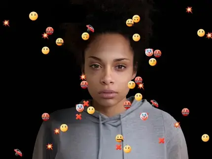 16 Days of Activism 2025 campaign image. In the photo a woman looks at the camera surrounded by hateful emojis. Photo: UN Women. 