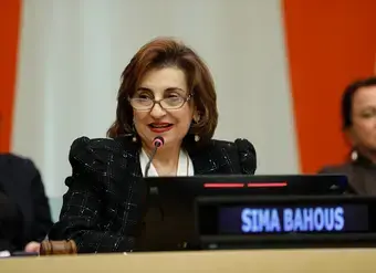 Scene from the CSW70 side event “Bridging Systemic Gaps: Advancing Justice for All Women and Girls,” held in the ECOSOC Chamber at United Nations Headquarters in New York on 10 March 2026. UN Under-Secretary-General and UN Women Executive Director Sima Bahous speaking into a microphone, with her nameplate visible in front of her.