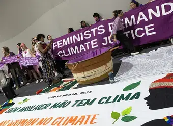 Delegates at COP30 in Belém, Brazil demonstrate to raise awareness about the gender dimension of climate justice