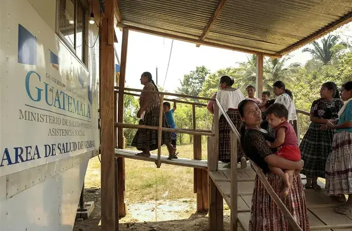A free government-run mobile health clinic is seen in Guatemala, where it serves 70 to 80 people per day. 
