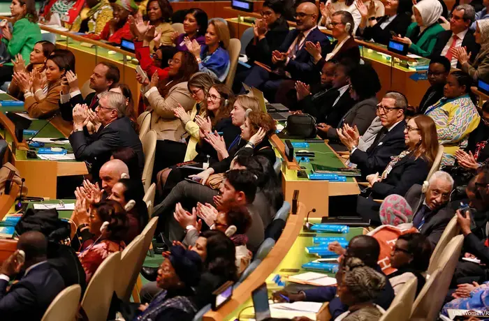 Representatives of UN Member States celebrate the adoption of the resolution titled “Political Declaration on the occasion of thirtieth anniversary of the Fourth World Conference on Women” during the opening of the sixty-ninth session of the Commission on the Status of Women, 10 March 2025, UN headquarters. Photo: UN Women/Ryan Brown.