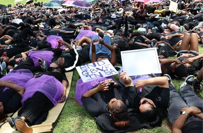 Protesters observe 15 minutes of silence at the Union Buildings in Pretoria on 21 November 2025, lying on the ground to honour the 15 women killed daily in South Africa. Photo: UN Women/Maphuti Mahlaba