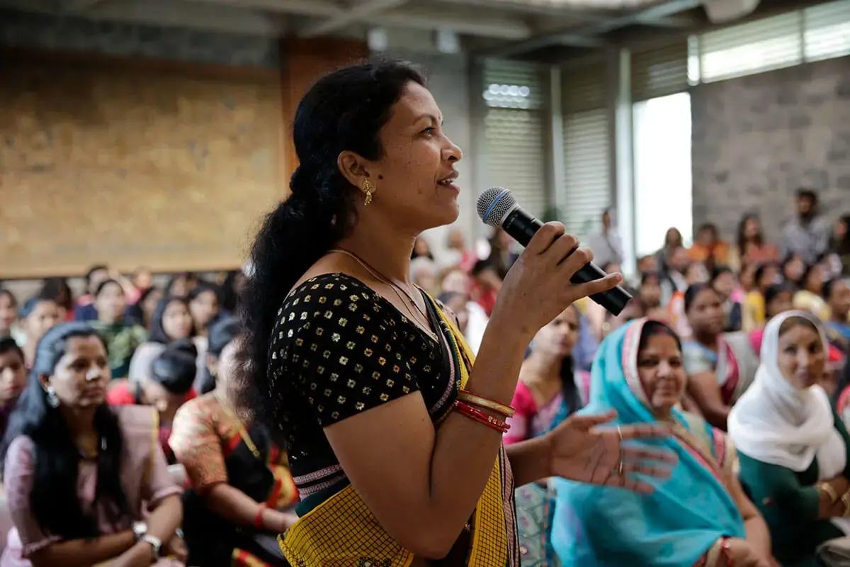 Jemamani Soren, a former local government representative, is seen speaking in Thakurmunda, Odisha, India. 