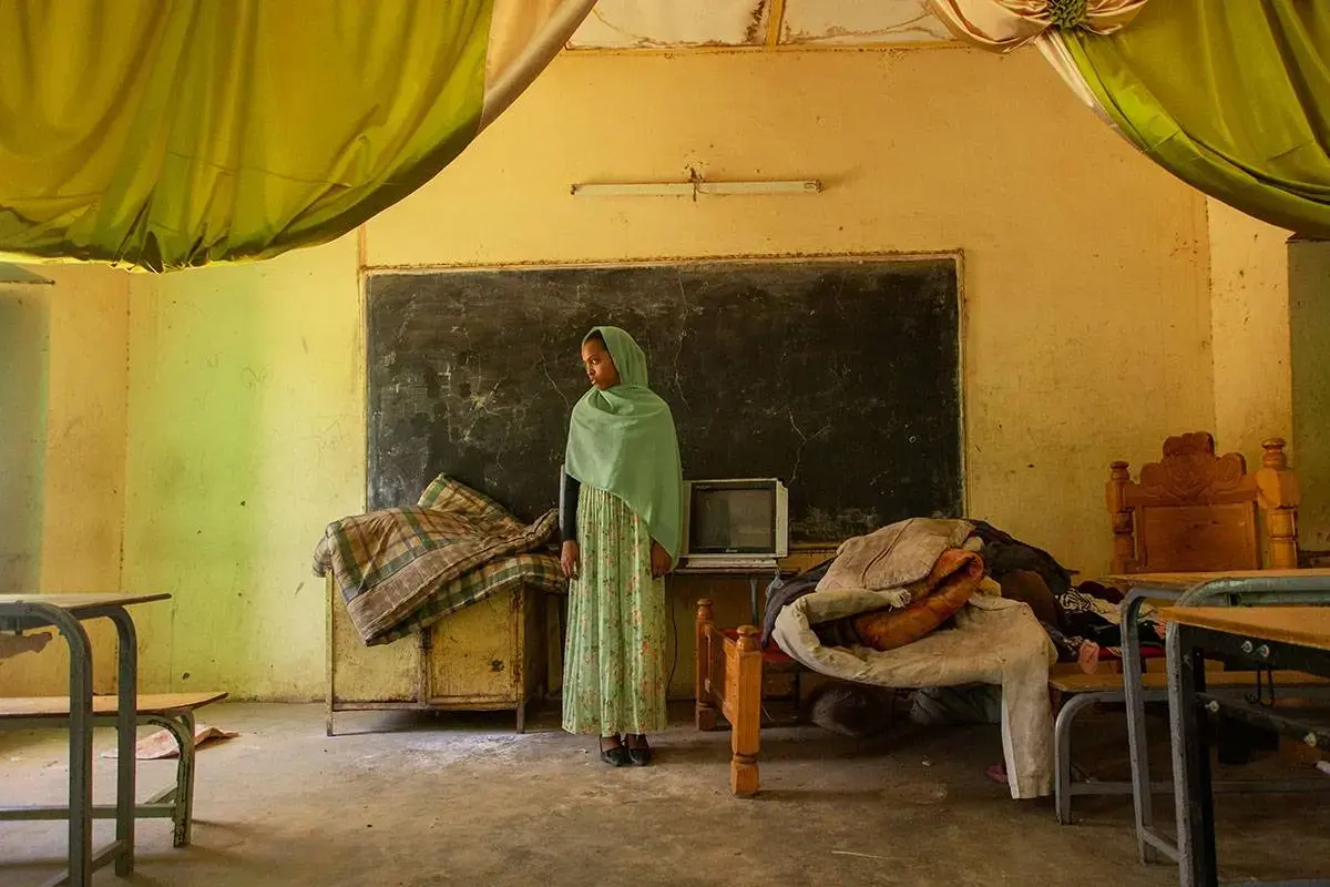 When the conflict erupted in Khartoum, Ruweda and hersiblings fled without their father. Its been a whole year since they last saw him.. Kassala state, March 2024. Photo: UNICEF/UNI547360/Ahmed Mohamdeen Elfatih.