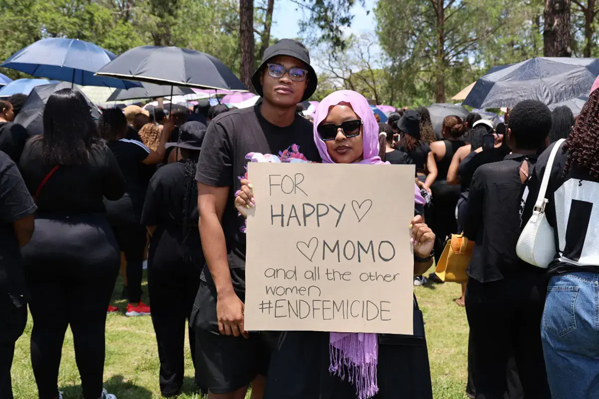 Lebogang Ntsia (right) joins thousands at the Union Builidings in Pretoria to demand an end to gender-based violence, standing in solidarity with loved ones who have experienced GBV and femicide. Photo: UN Women/Maphuti Mahlaba