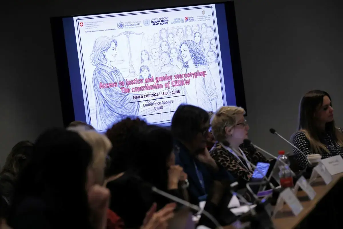 A presentation displays on a large screen